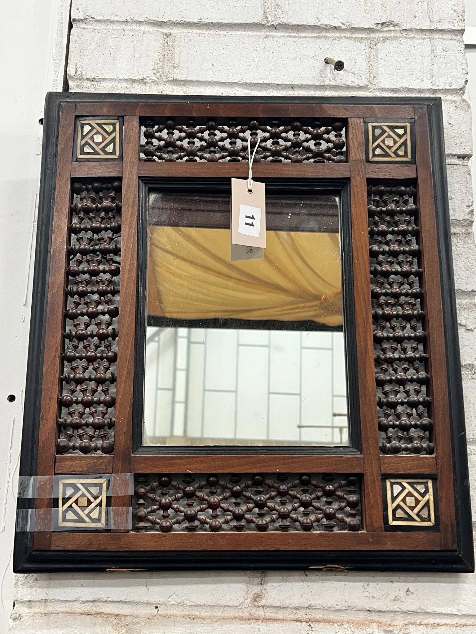 A Moorish mother of pearl inlaid wall mirror, width 41cm, height 47cm